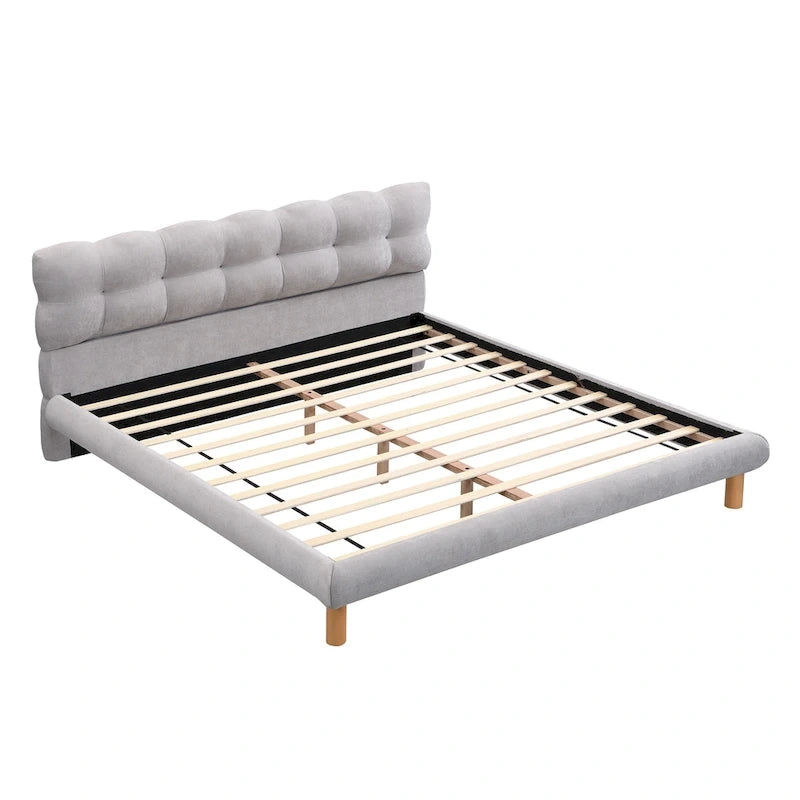 Lit plateforme rembourré format King avec tête de lit ronde
