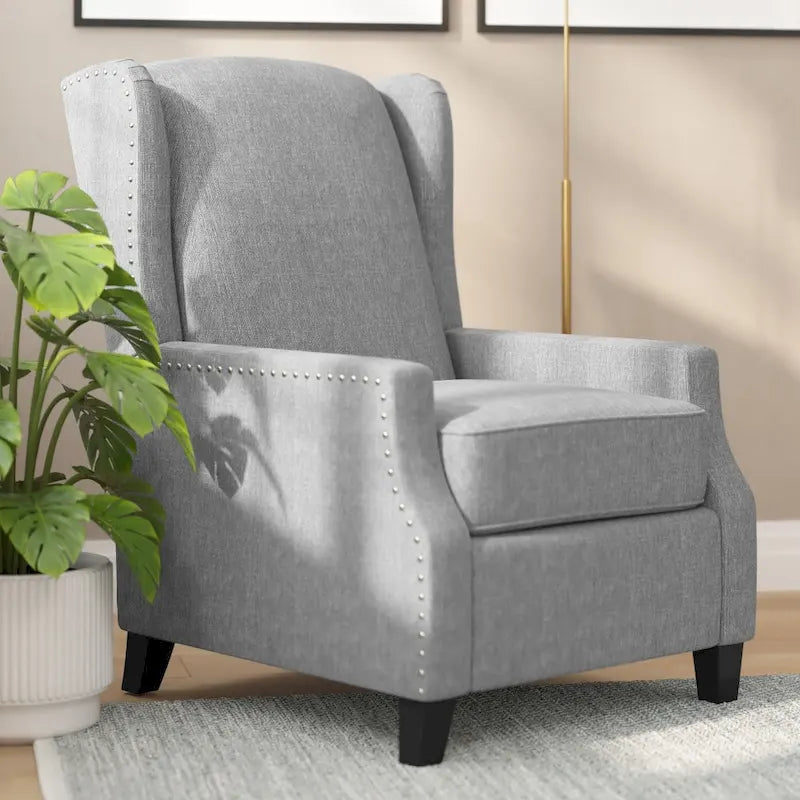Fauteuil inclinable à dossier haut avec ressorts ensachés et garniture cloutée