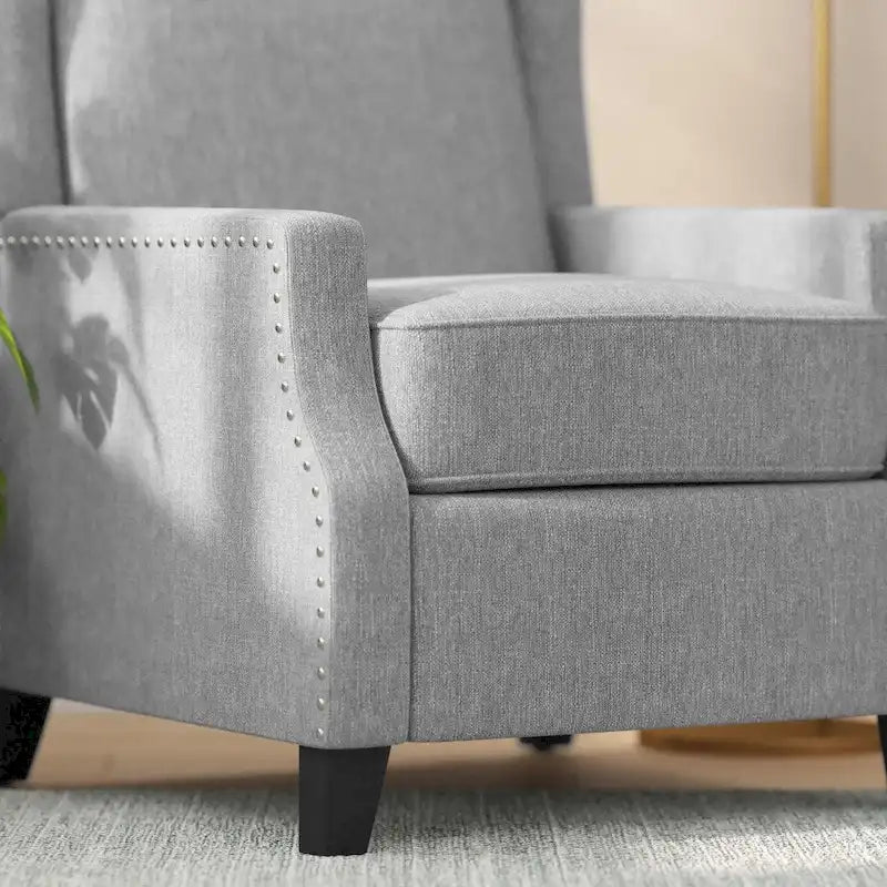 Fauteuil inclinable à dossier haut avec ressorts ensachés et garniture cloutée