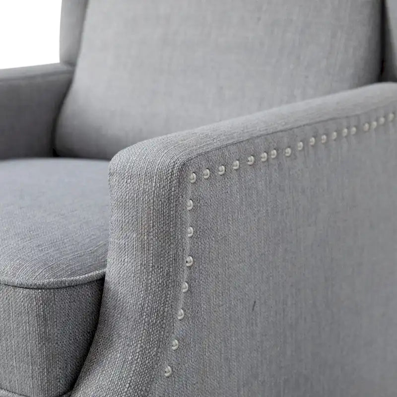 Fauteuil inclinable à dossier haut avec ressorts ensachés et garniture cloutée