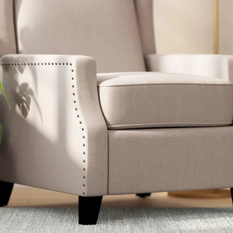 Fauteuil inclinable à dossier haut avec ressorts ensachés et garniture cloutée