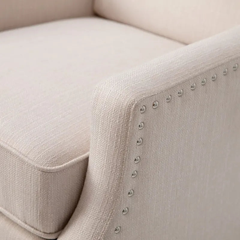 Fauteuil inclinable à dossier haut avec ressorts ensachés et garniture cloutée