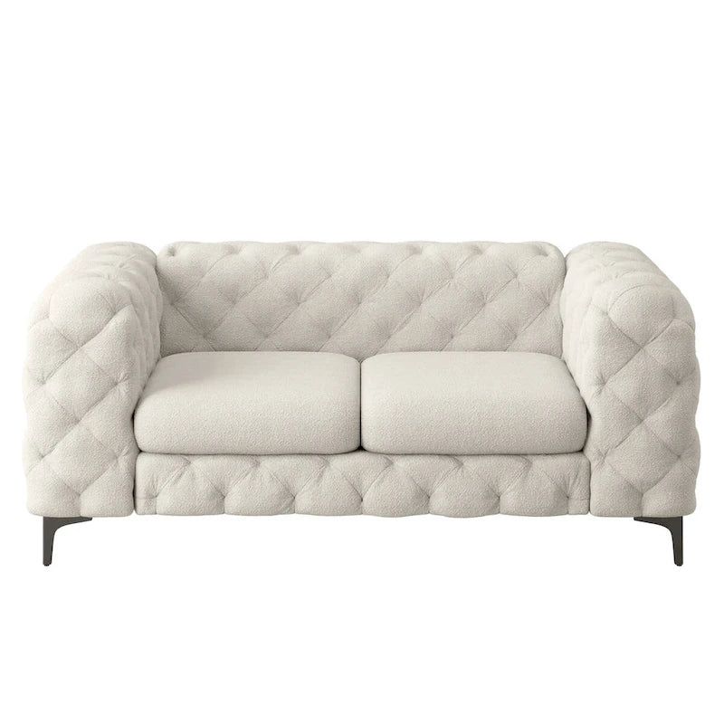 Causeuse Chesterfield capitonnée en velours