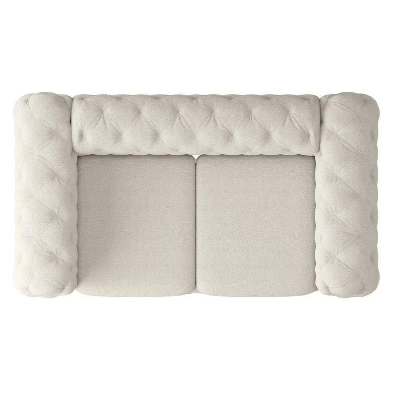 Causeuse Chesterfield capitonnée en velours