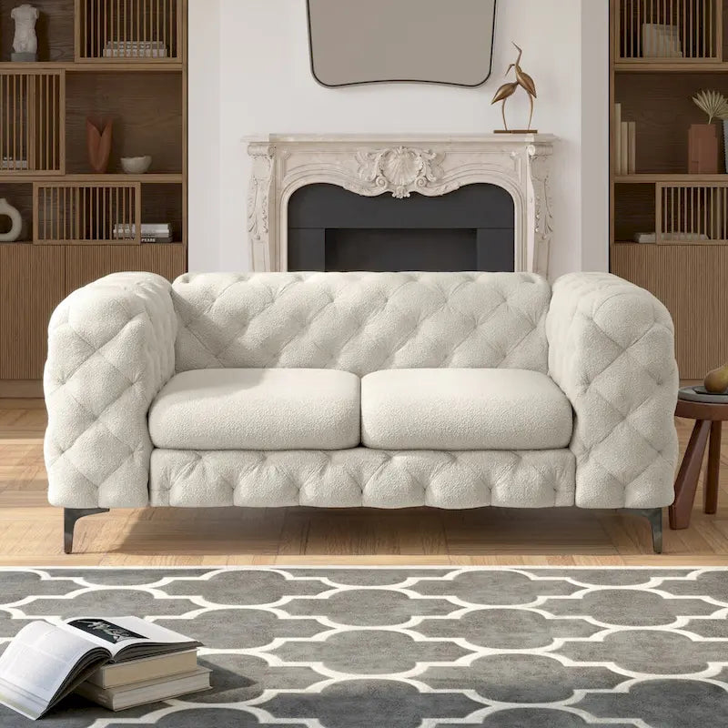 Causeuse Chesterfield capitonnée en velours