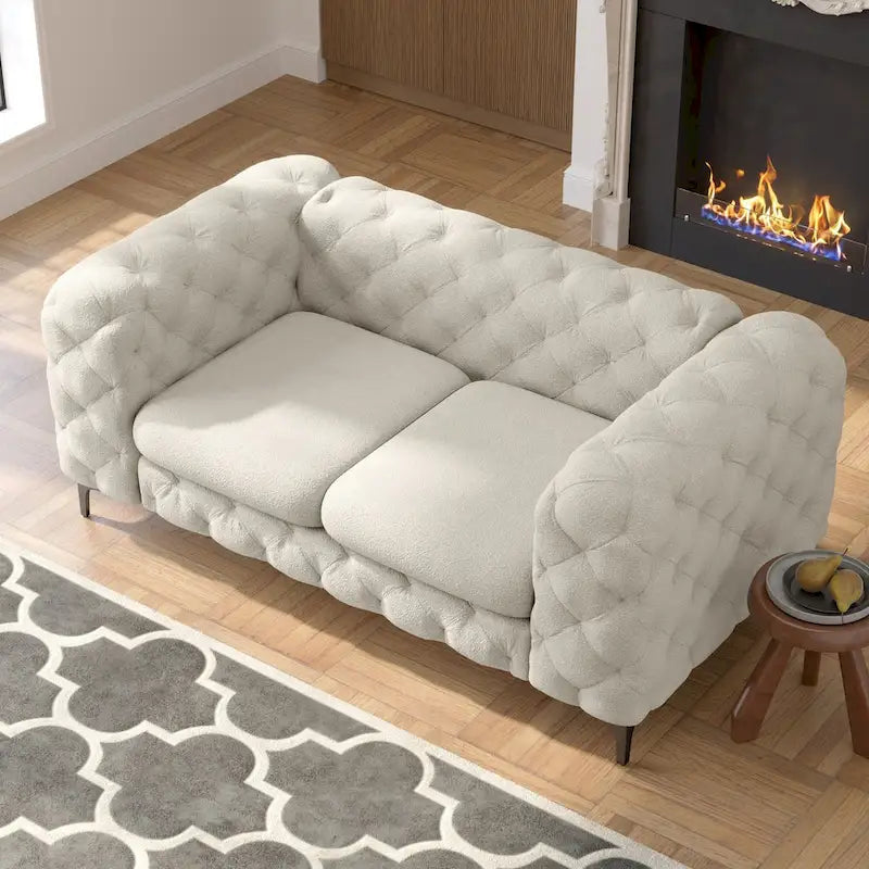 Causeuse Chesterfield capitonnée en velours