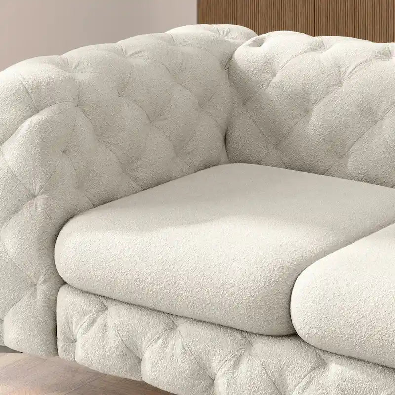 Causeuse Chesterfield capitonnée en velours
