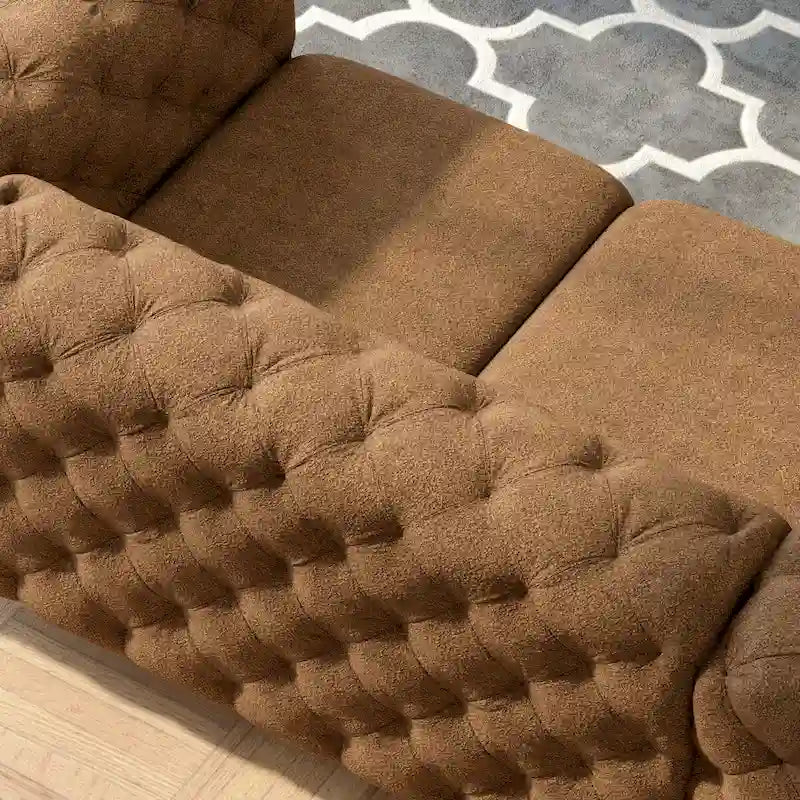 Causeuse Chesterfield capitonnée en velours